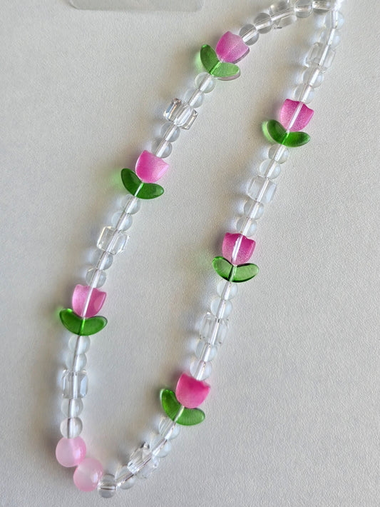 Bijou téléphone en perles et fleurs