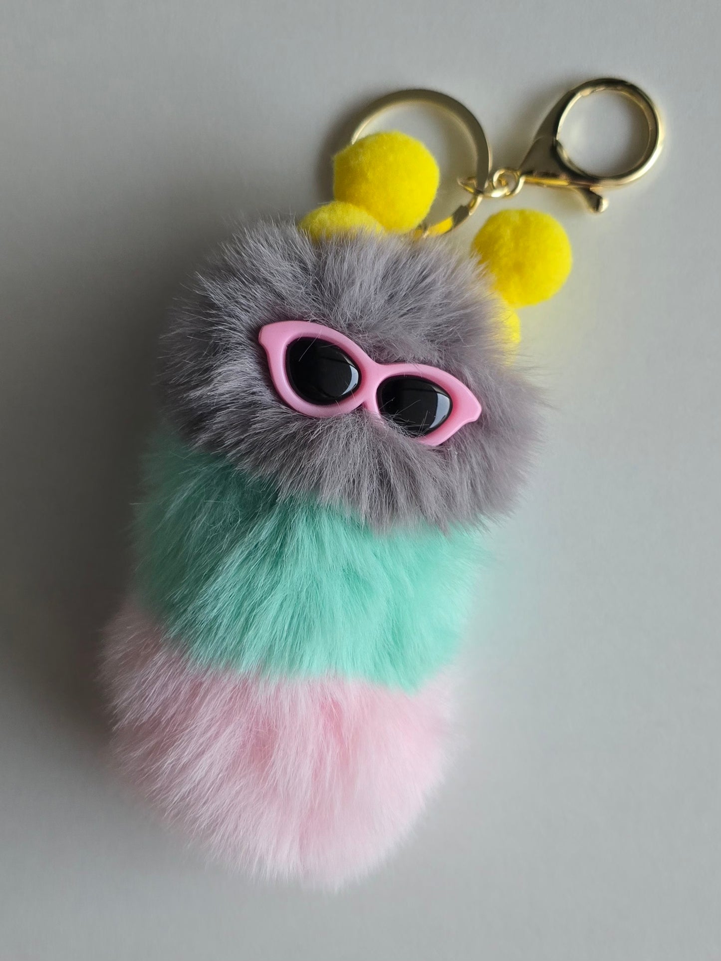 Porte-clé mini chenille pompons