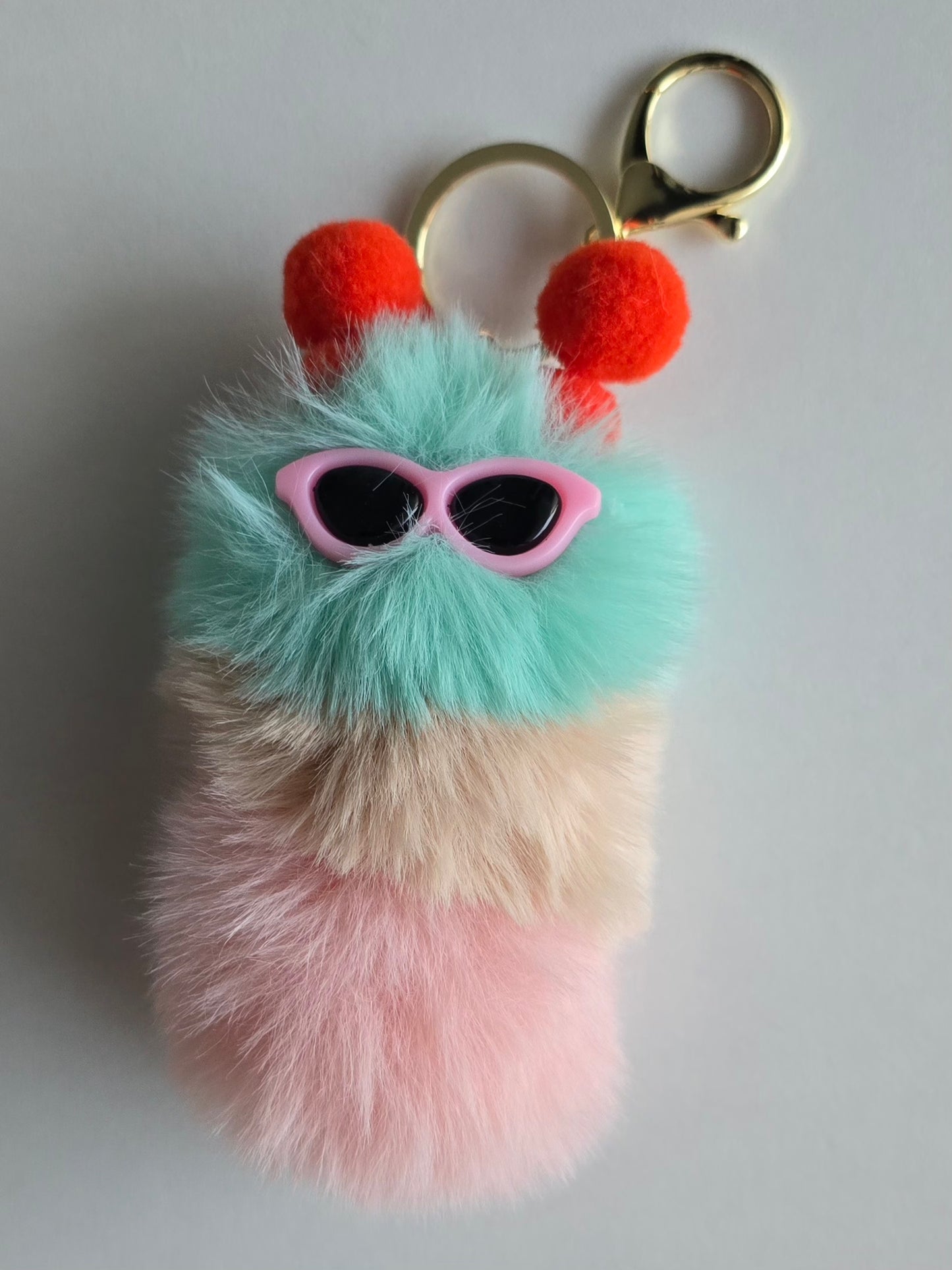 Porte-clé mini chenille pompons