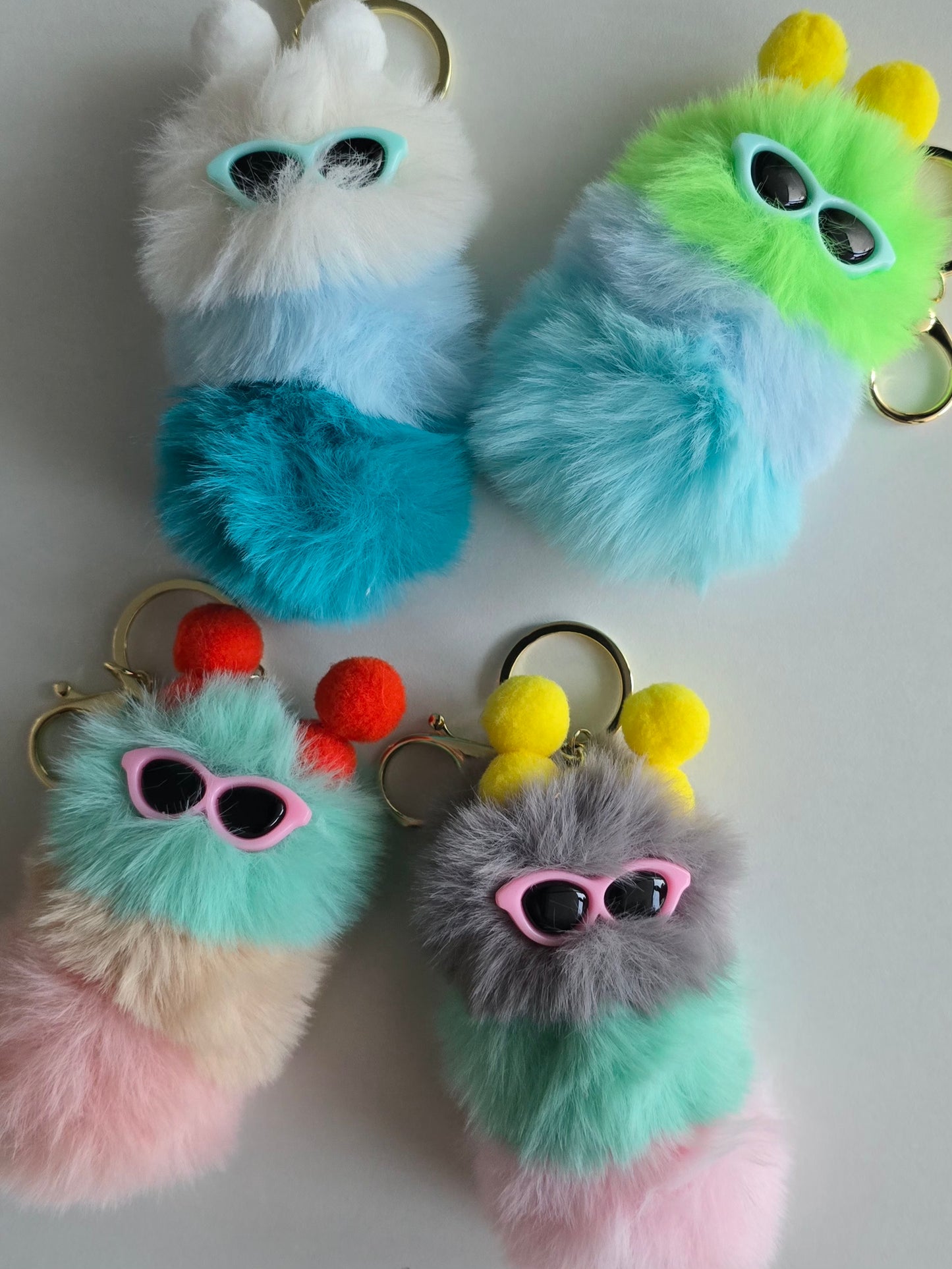 Porte-clé mini chenille pompons