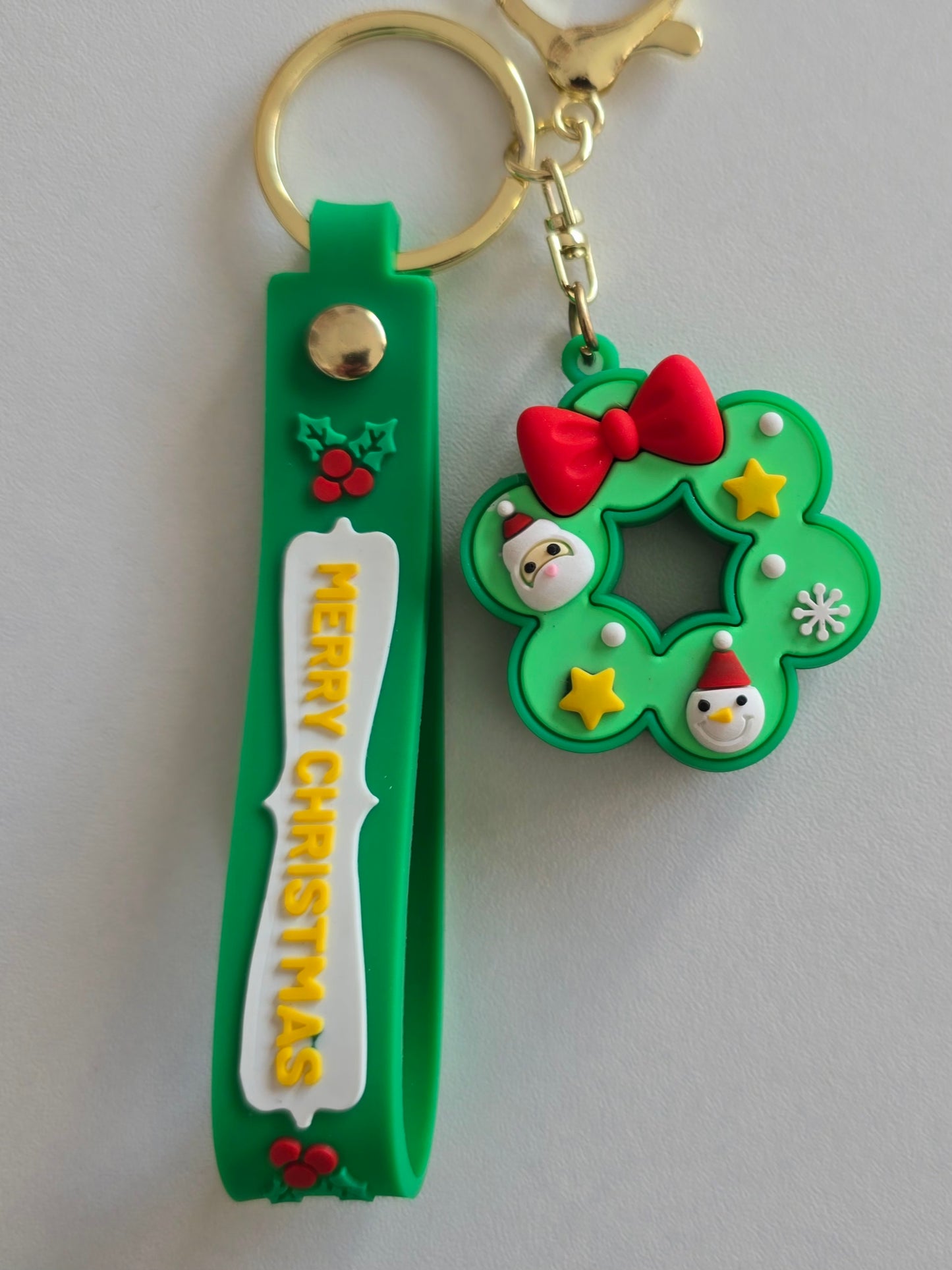 Porte-clés festif Lumi avec sangle verte Merry Christmas
