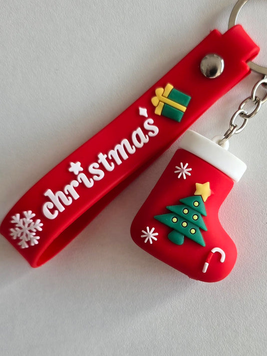 Porte-clés festif rouge et vert avec motifs cadeaux, sapin et flocons de neige