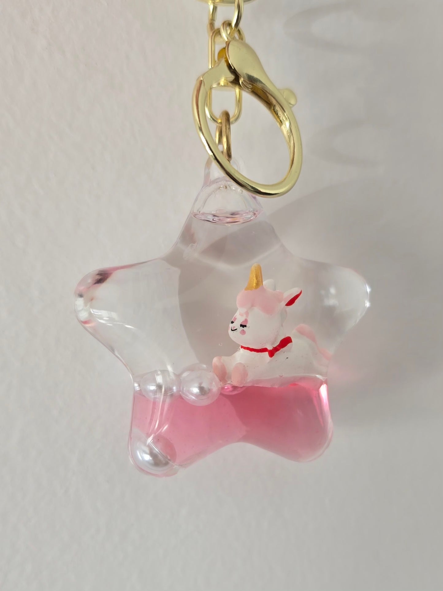 porte-clé liquide étoile licorne rose