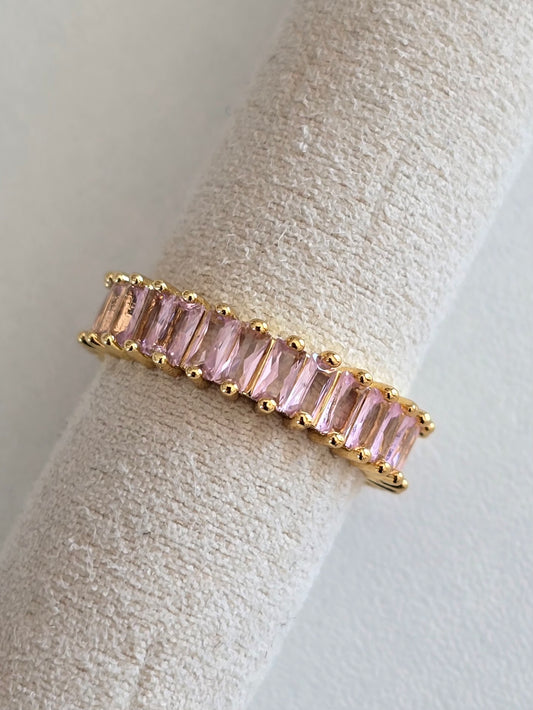 Bague dorée ornée de pierres roses