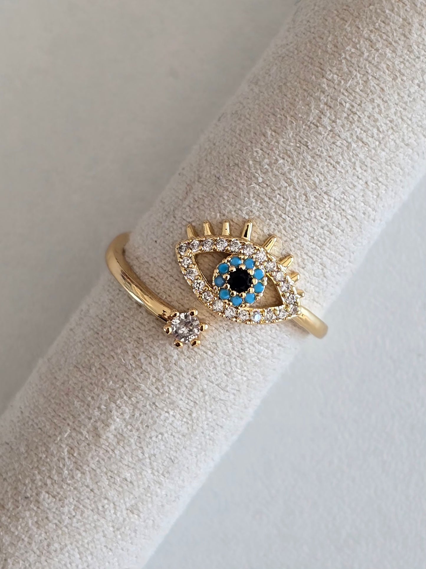 Bague en acier inoxydable doré et oeil protecteur