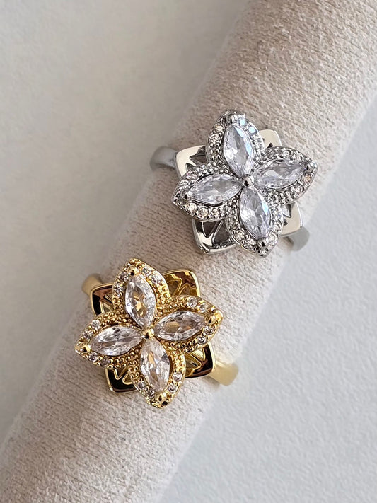 Bague Elyna dorée et argentée en acier inoxydable avec fleur rotative