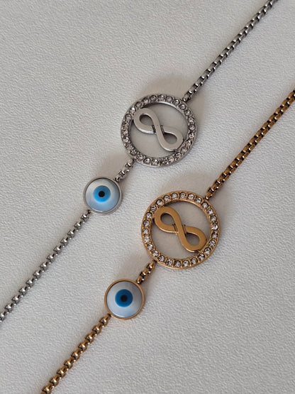 bracelet acier inoxydable argenté et doré, motif infini et oeil bleu protecteur 