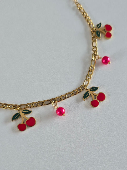 Bracelet en acier inoxydable doré avec pendentifs cerises rouges et perles roses 