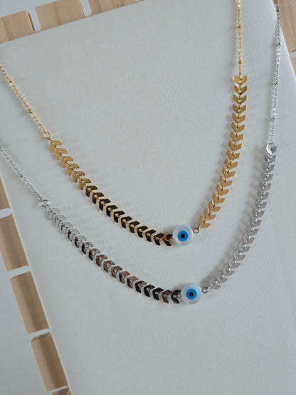collier minimaliste doré, acier inoxydable et oeil protecteur bleu porte-bonheur