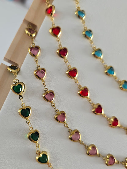 collier acier inoxydable doré, design coeurs roses translucides 