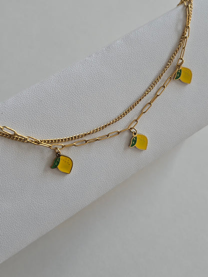 bijou estival tendance : bracelet de cheville doré avec charms citron 