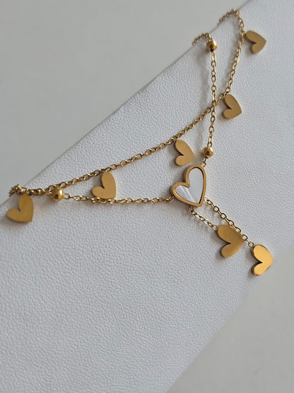 bijou romantique pour femme : bracelet de cheville doré avec double chaîne et pendentifs coeurs 
