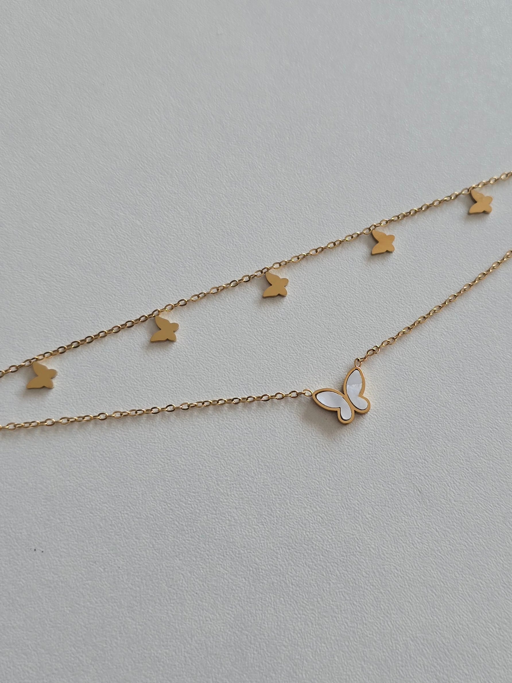 bracelet de cheville Elysia en acier inoxydable doré avec papillons