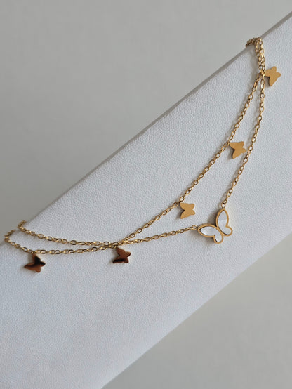 bijou raffiné pour femme : bracelet de cheville papillon doré et blanc 
