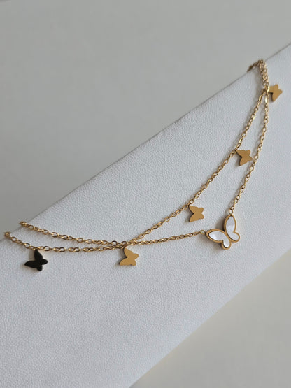 bracelet de cheville romantique Elysia avec papillons dorés et pendentif blanc