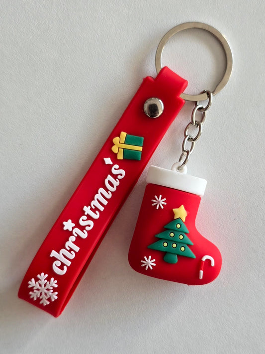 Porte-clés Jolly de Noël avec sangle rouge décorée et chaussette sapin