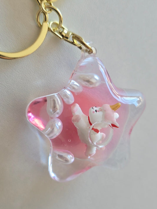 porte-clé licorne kawaii dans une étoile transparente 