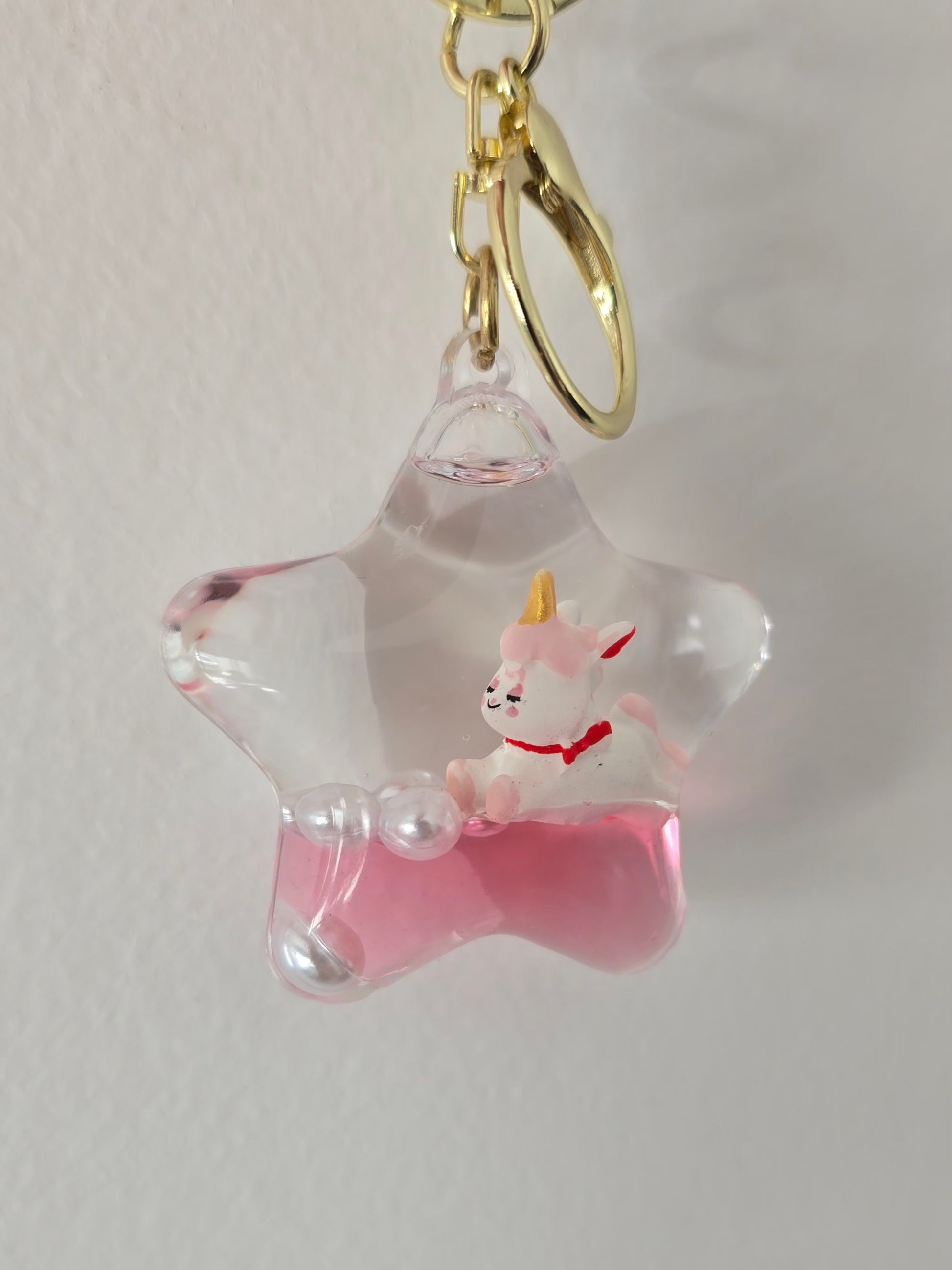 porte-clé magique en forme d'étoile avec licorne