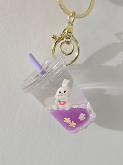 porte-clé liquide milkshake violet et lapin blanc