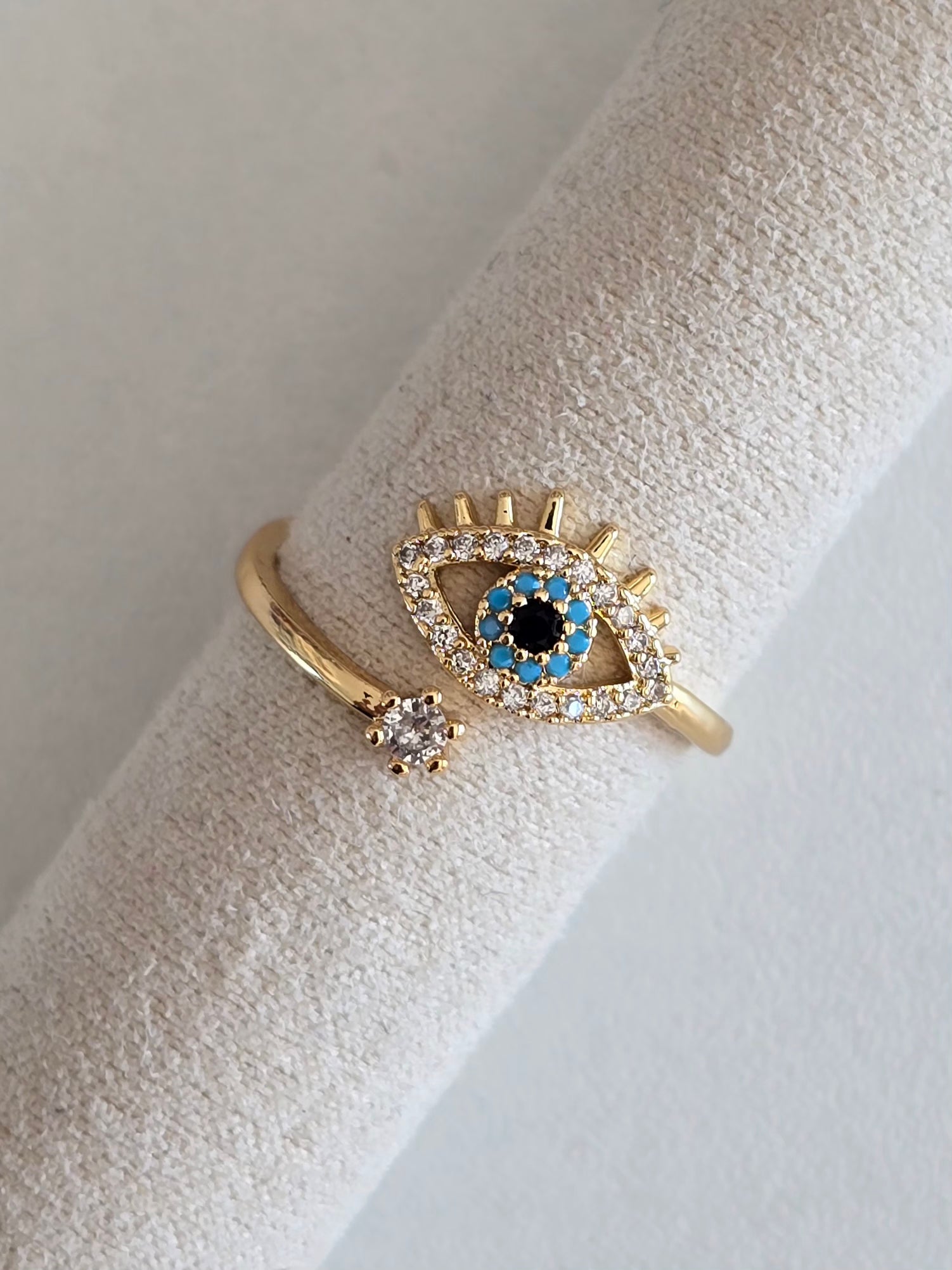 Bague en acier inoxydable doré et oeil protecteur 
