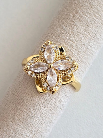 Bague Elyna fleur rotative sertie de strass