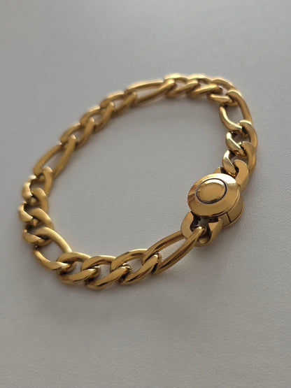 Bracelet Atlas fermé avec fermoir à bouton poussoir sécurisé