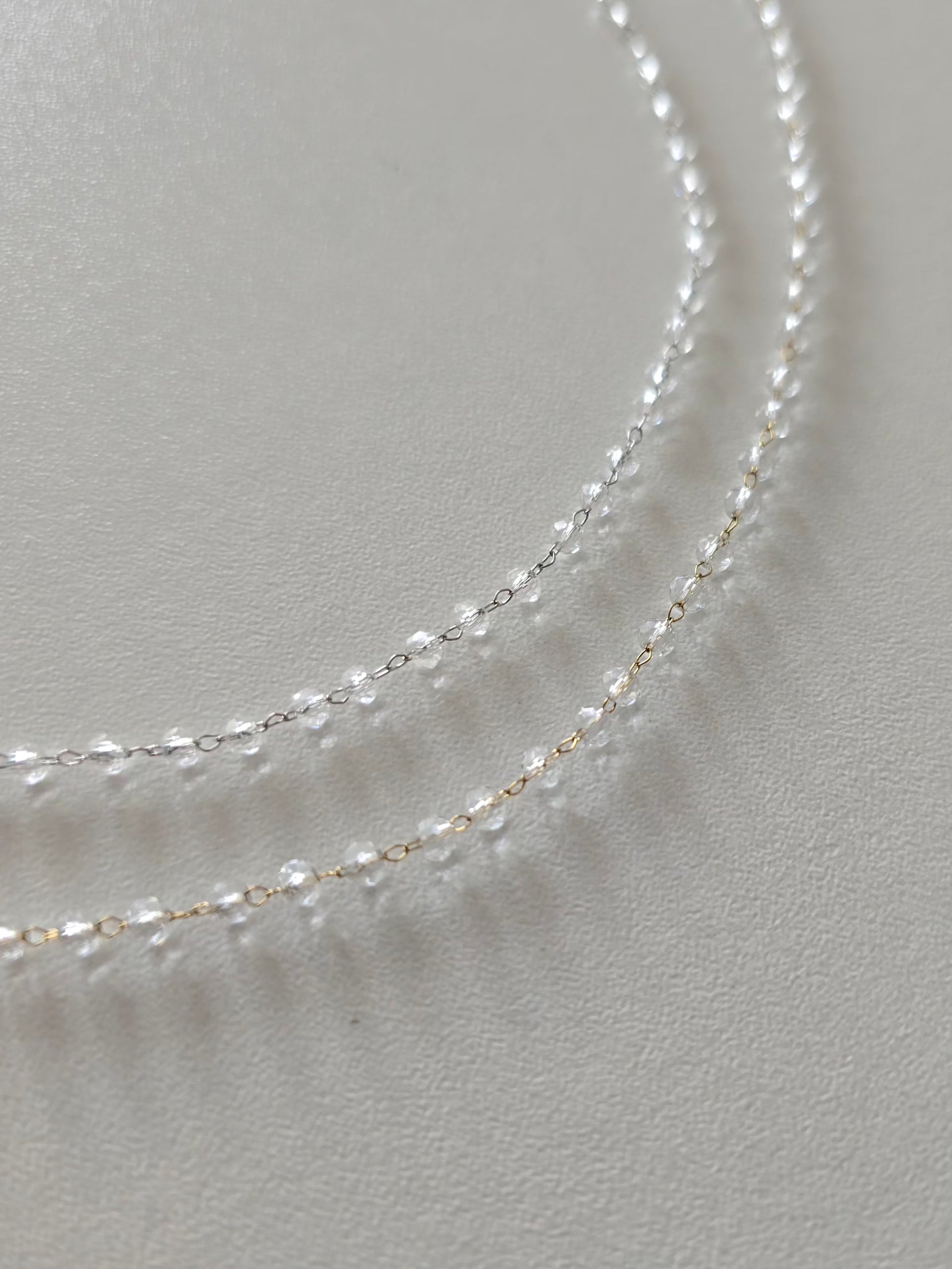 Bracelet Clarity en acier inoxydable doré et argenté avec perles transparentes 3 mm