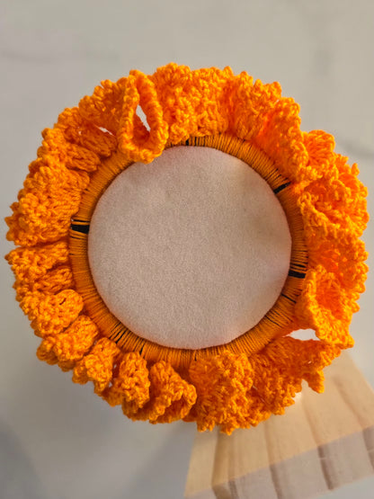 Texture du fil coton sur chouchou orange fait main