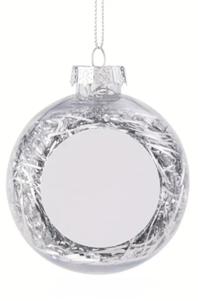 Boule de Noël personnalisée transparente avec cheveux d'ange argentés.