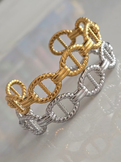 Bracelets Maëlys doré et argenté en acier inoxydable avec design à maillons élégants. 