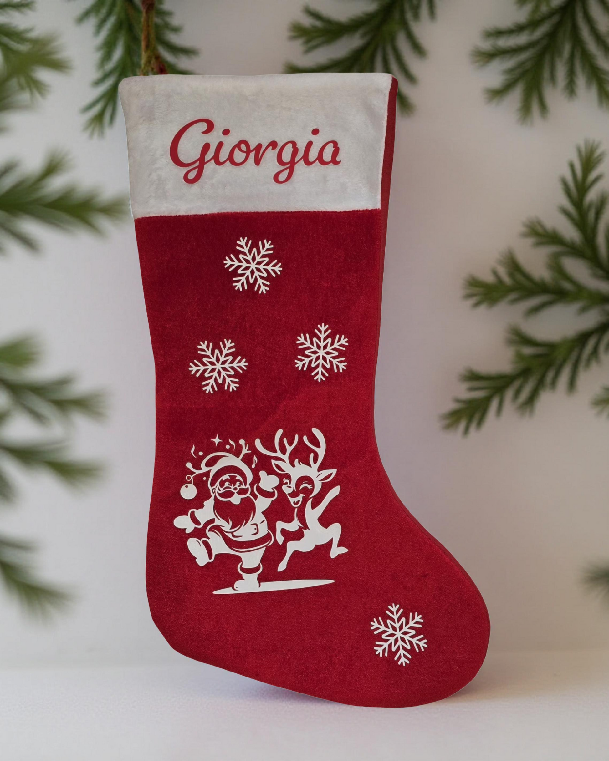 Chaussette de Noël personnalisée pour Giorgia avec flocons et le Père Noël avec son renne dansant.