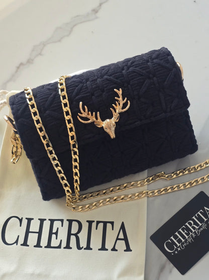 Sac artisanal noir au style élégant et affirmé 