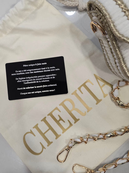 Intérieur du sac blanc et doré avec doublure fleurie