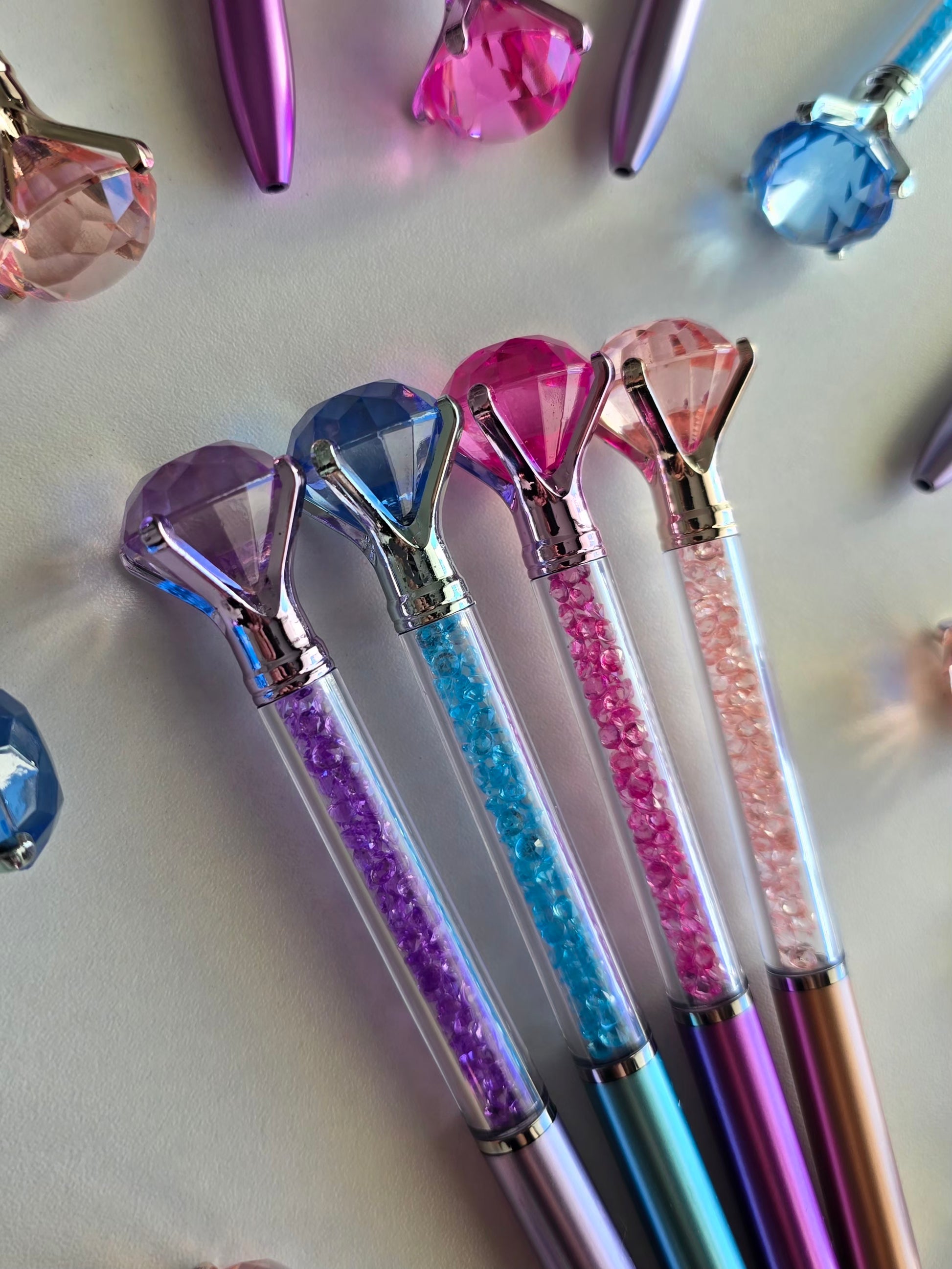 stylo rose gold élégant avec tête diamant